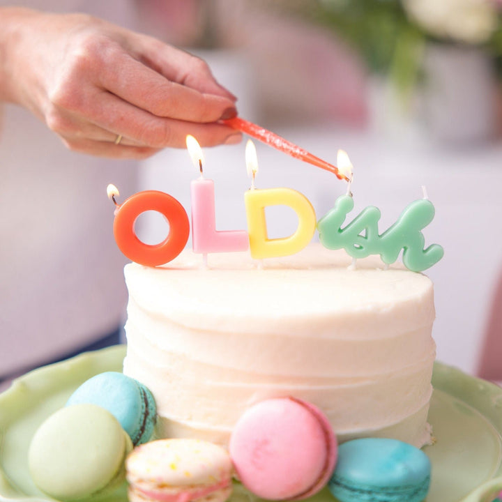 OLDish birthday candle set in colorful letter candles for milestone cakes