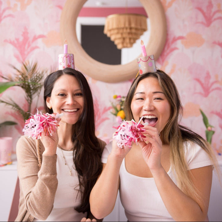 Pink confetti party blower with tissue paper fringe