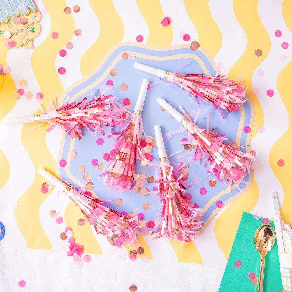 Pink confetti party blower with tissue paper fringe
