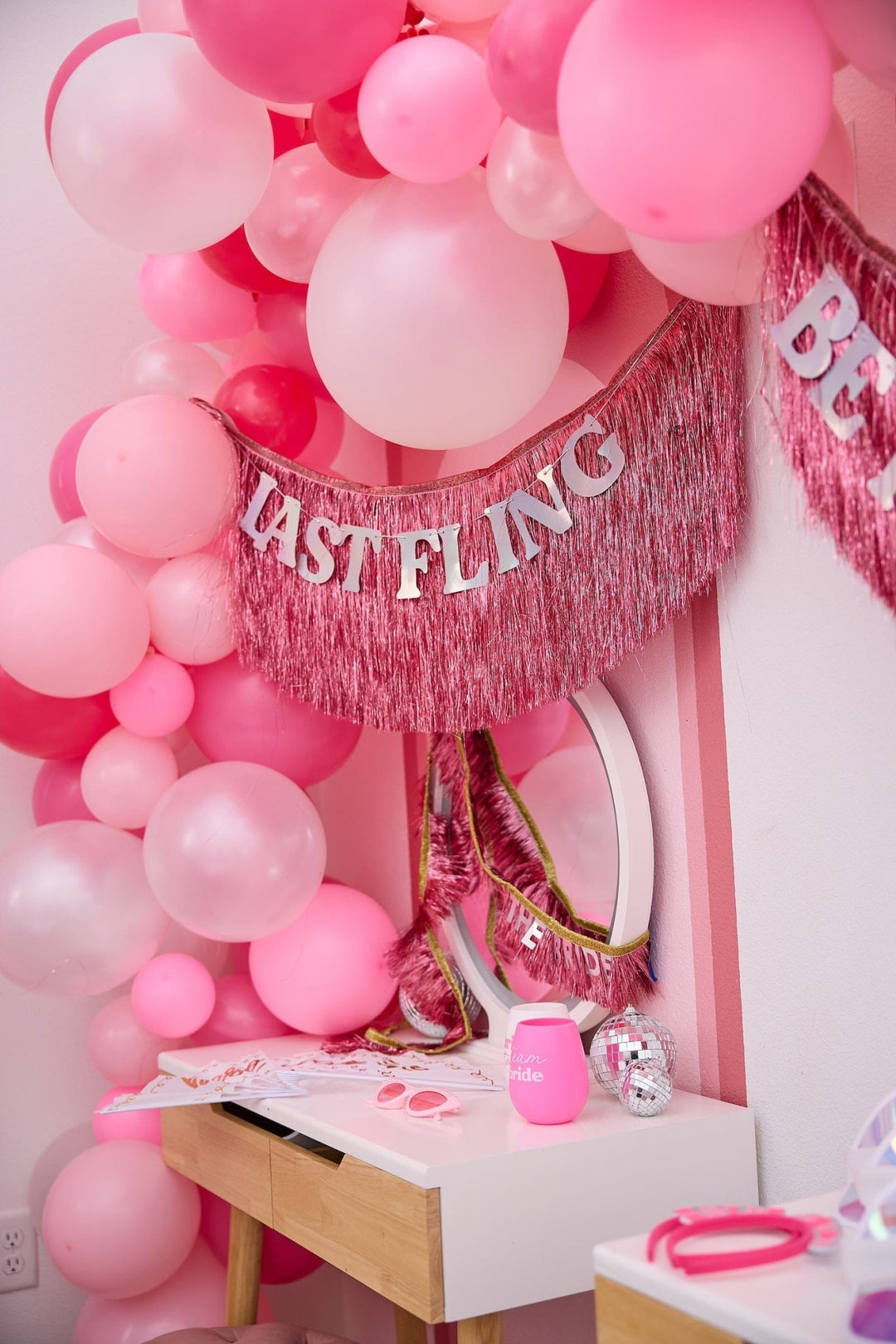 Blush to rose pink balloon garland for birthdays, showers, and bachelorettes