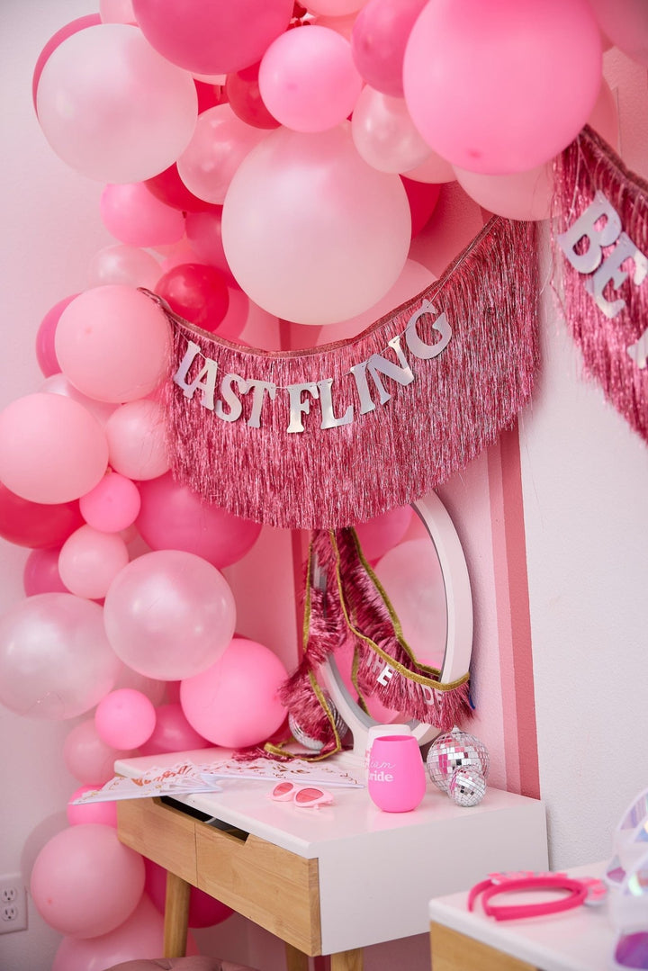 Blush to rose pink balloon garland for birthdays, showers, and bachelorettes