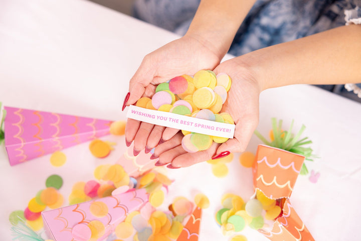 Easter carrot crackers with gold foil papers, confetti, and metal charms