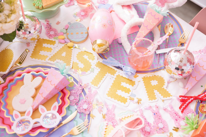 Easter carrot crackers with gold foil papers, confetti, and metal charms