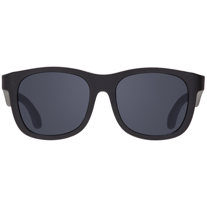 Black aviator kids sunglasses shown from the front with smoke lenses on a plain background.