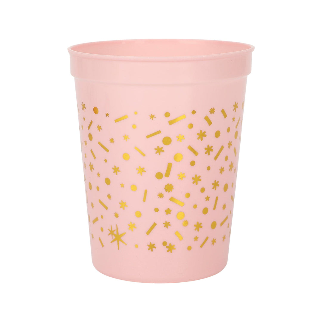 Back of the pink birthday cup showing the gold confetti dot pattern