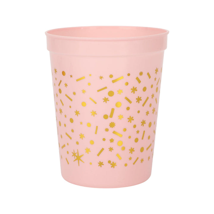 Back of the pink birthday cup showing the gold confetti dot pattern