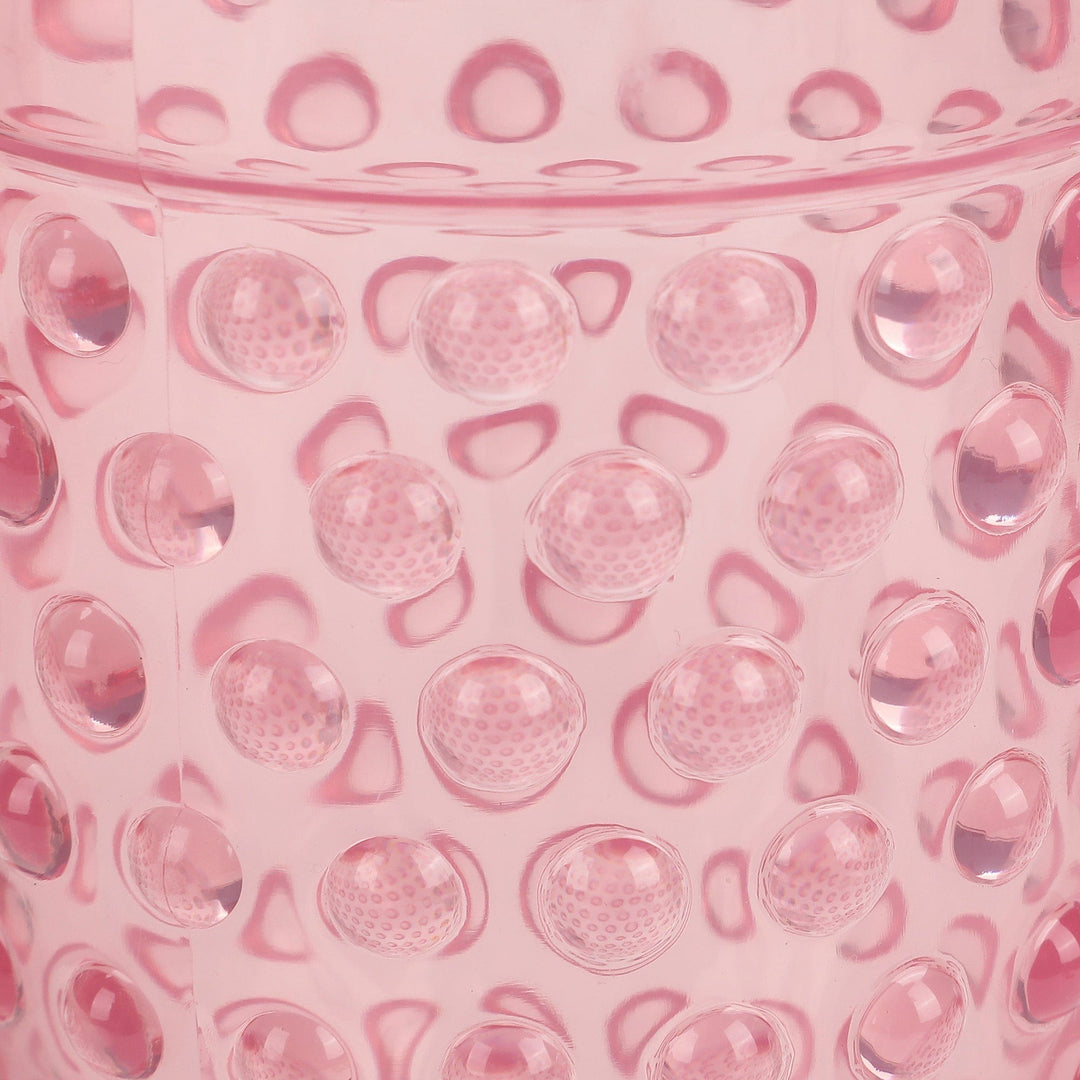 Close-up of the raised hobnail dots on the pink goblet