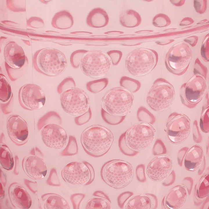 Close-up of the raised hobnail dots on the pink goblet
