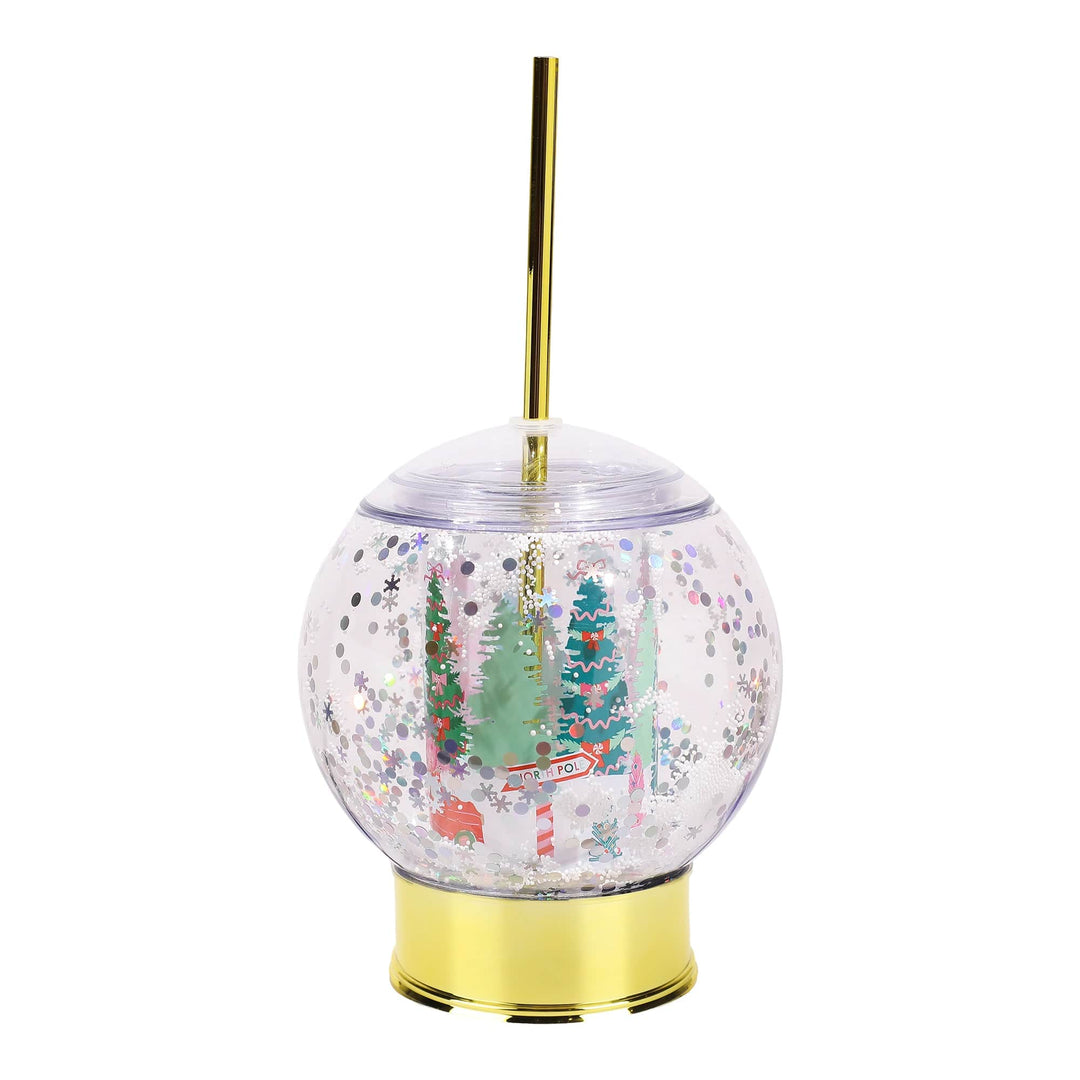 Holiday snow globe sipper cup with a shakeable Christmas snow scene and gold reusable straw for festive drinks