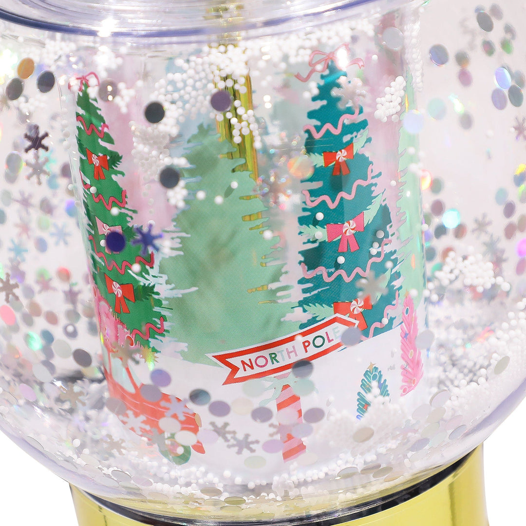 Holiday snow globe sipper cup with a festive winter scene for Christmas cocktails and cocoa