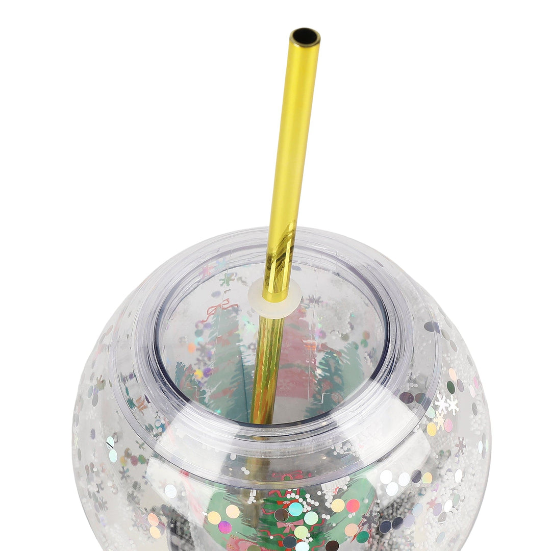 Holiday snow globe sipper with a printed Christmas scene and gold base for holiday entertaining