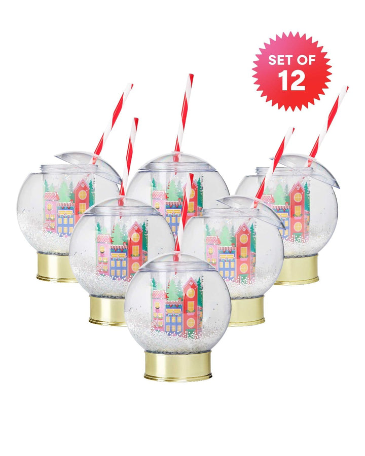 Set of 12 holiday village snow globe cups arranged in rows with striped straws