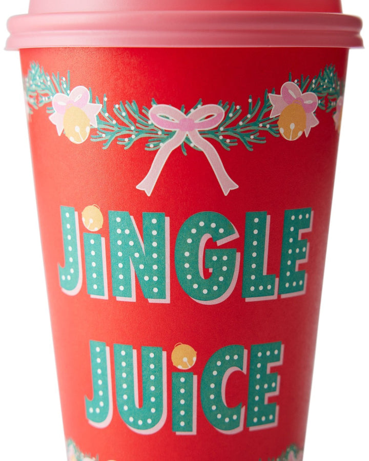 Close-up of the Jingle Juice print on a red Christmas cup with a pink lid