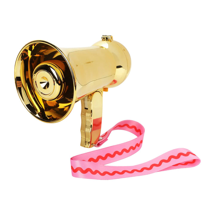Gold party megaphone with a pink and red rickrack wrist strap on a white background