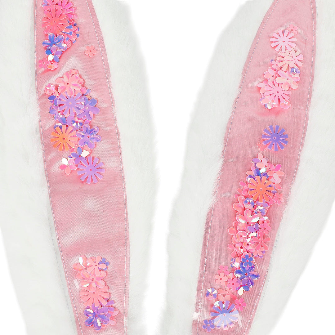 Close-up of the pastel flower and sequin confetti inside the pink bunny ear panels