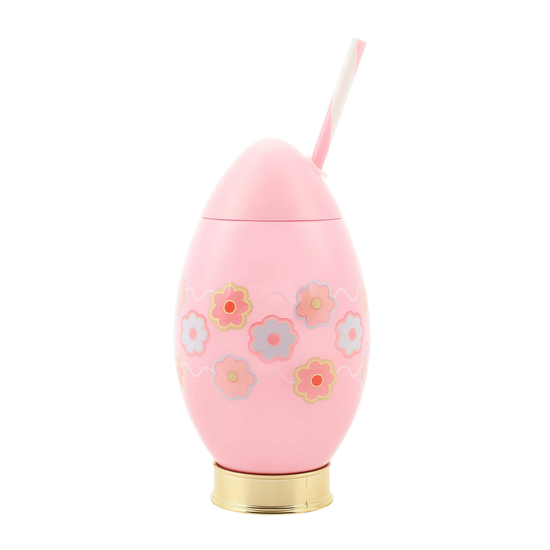 Pink Easter egg sipper cup with pastel flowers, a gold base, and a pink striped straw