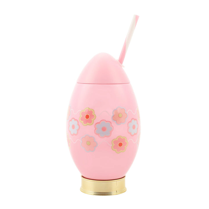 Pink Easter egg sipper cup with pastel flowers, a gold base, and a pink striped straw