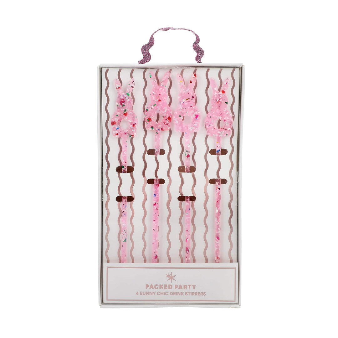 Four bunny shaped drink stirrers in clear pink acrylic filled with confetti and glitter