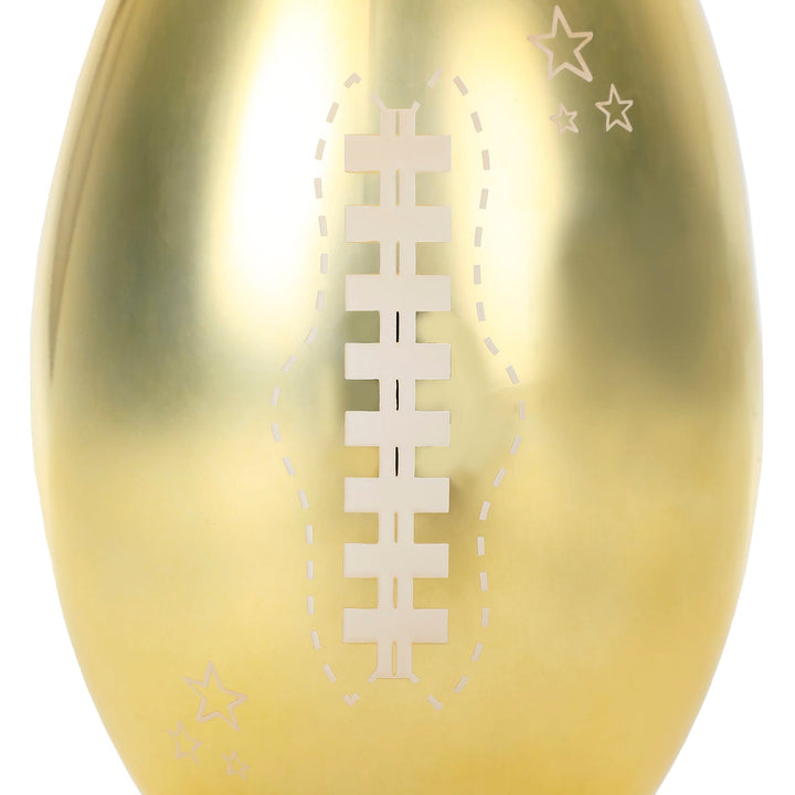 Close-up of the electroplated gold football cup's white laces and star details