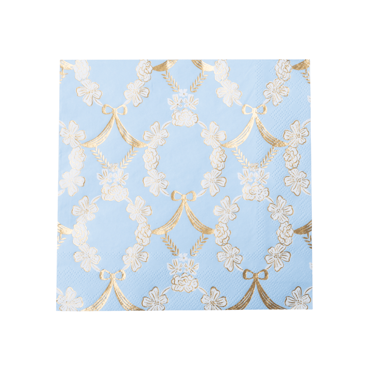 light blue paper napkins featuring a repeating pattern of white flowers and gold ribbons, shown on a clean white background.