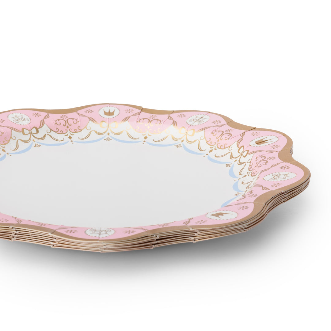 A stack of scalloped round serving platters with a pink and gold ornate border, shown on a clean white background.