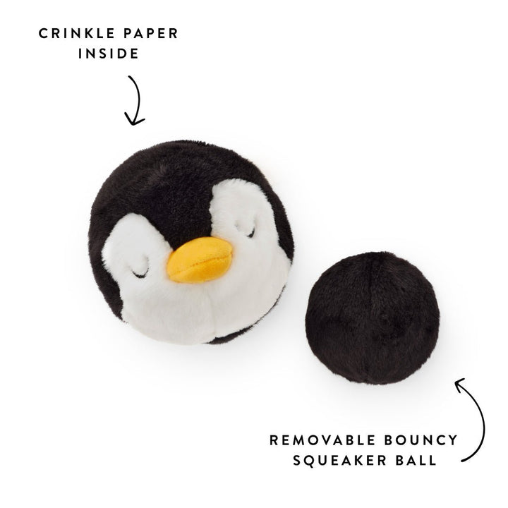 Penguin toy detail graphic showing crinkle paper and a removable black squeaker ball.