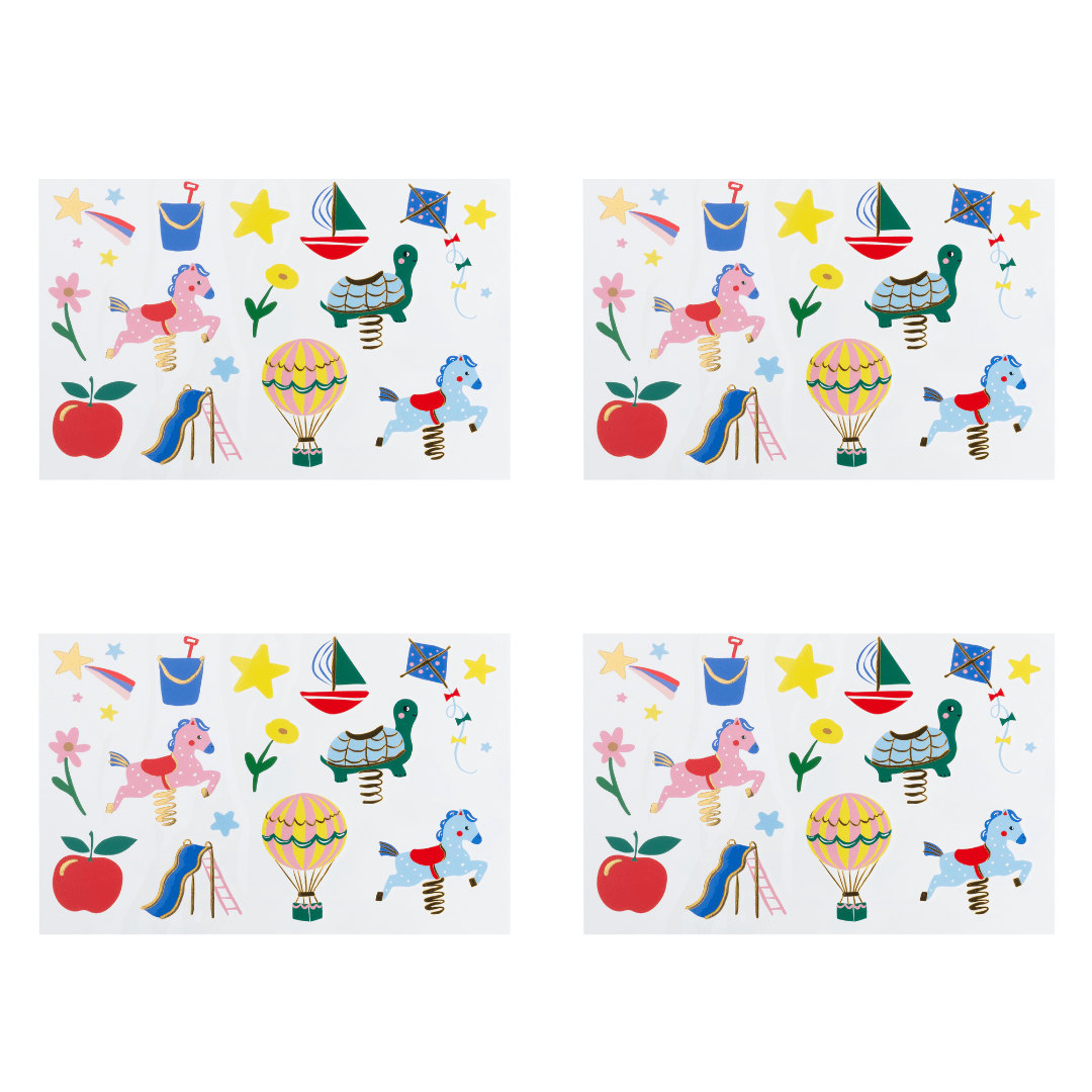Four identical temporary tattoo sheets arranged in a 2x2 grid on a white background. Each mat features a colorful whimsical pattern with a pink pony on a spring, a green turtle on a spring, a hot air balloon, a blue slide, yellow stars, flowers, and an apple.