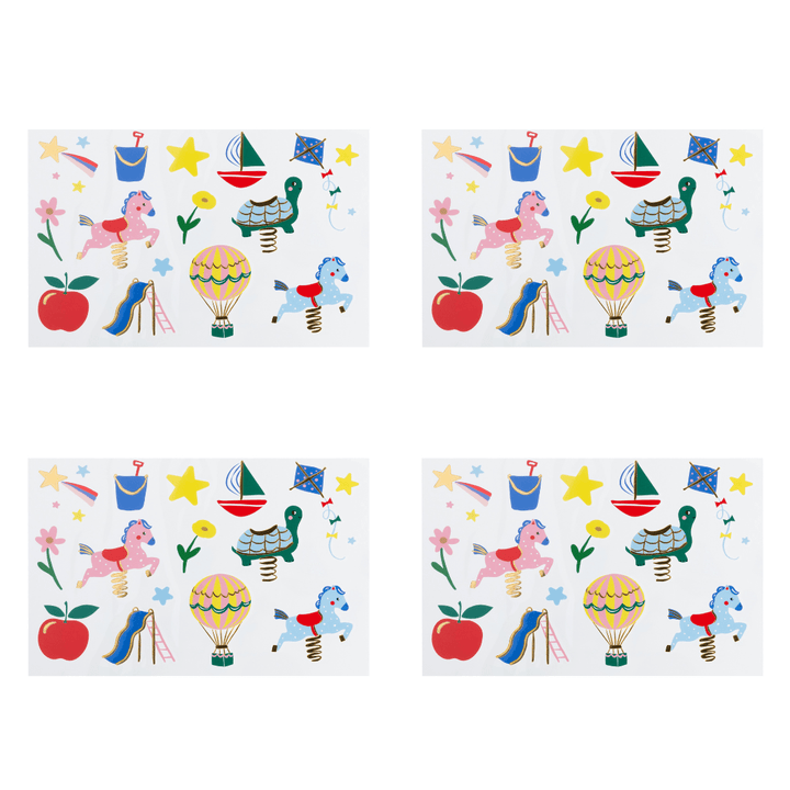 Four identical temporary tattoo sheets arranged in a 2x2 grid on a white background. Each mat features a colorful whimsical pattern with a pink pony on a spring, a green turtle on a spring, a hot air balloon, a blue slide, yellow stars, flowers, and an apple.