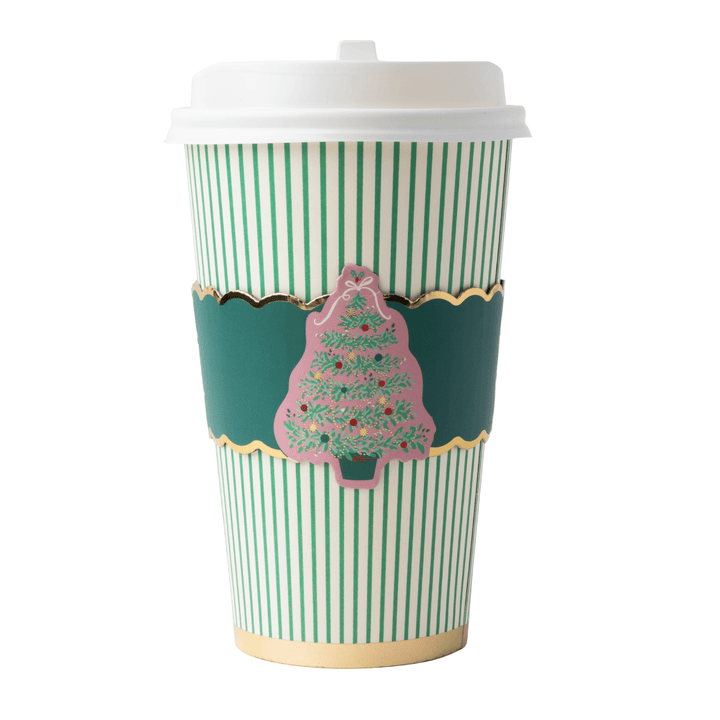 Coffee cups with green and white vertical stripes, featuring a dark green decorative band with gold trim and a pink Christmas tree illustration, on a white background.