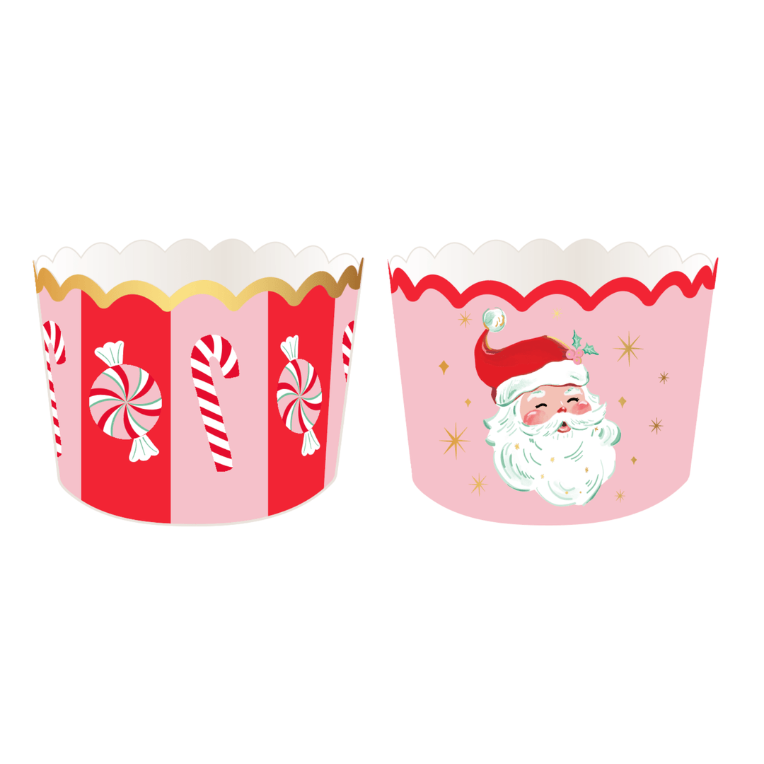 Two scalloped Christmas treat baking cups, one red and pink peppermint stripe and one pink with a vintage Santa face