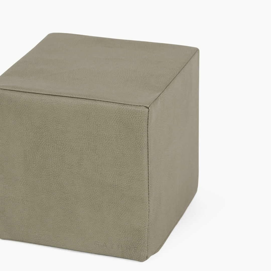 Olive vegan leather foam play cube, close-up of the durable stitched surface.