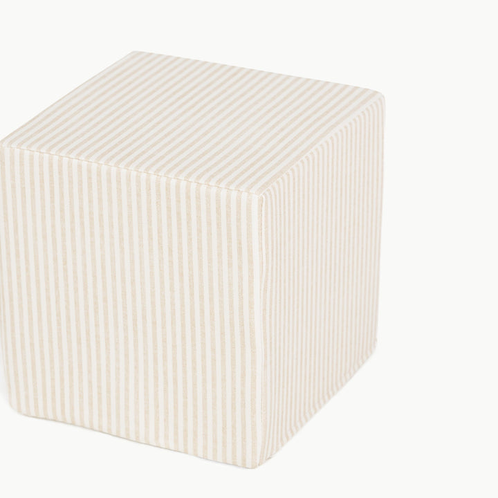 Beige pinstripe foam play cube for soft sitting and active indoor play.