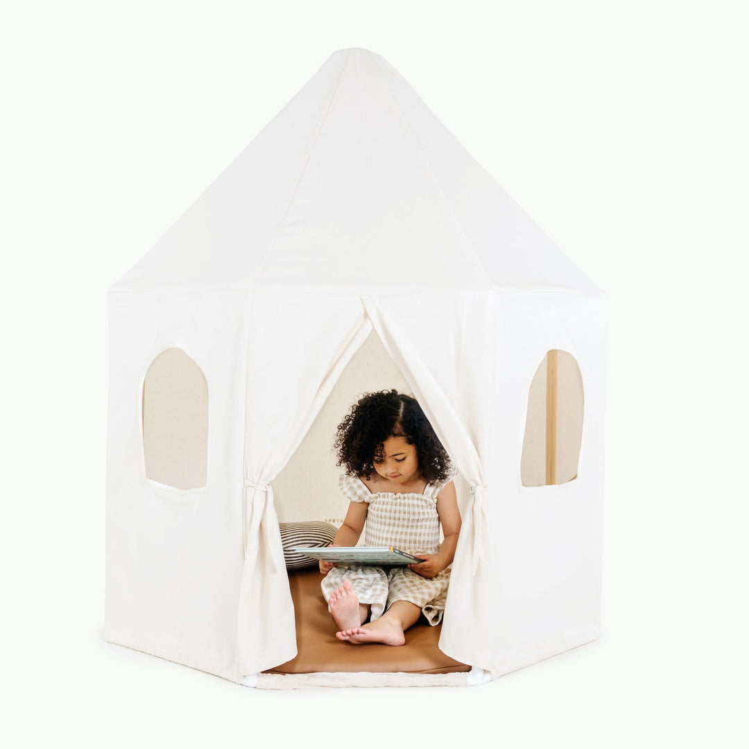 Child playing inside the Gathre kids' play tent.