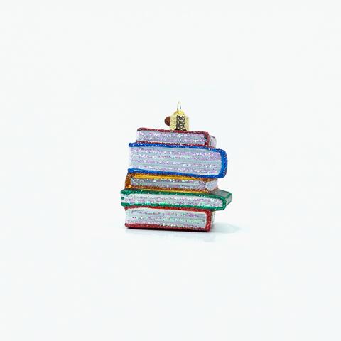 Stack of books ornament from the opposite side showing red, white, and green spines