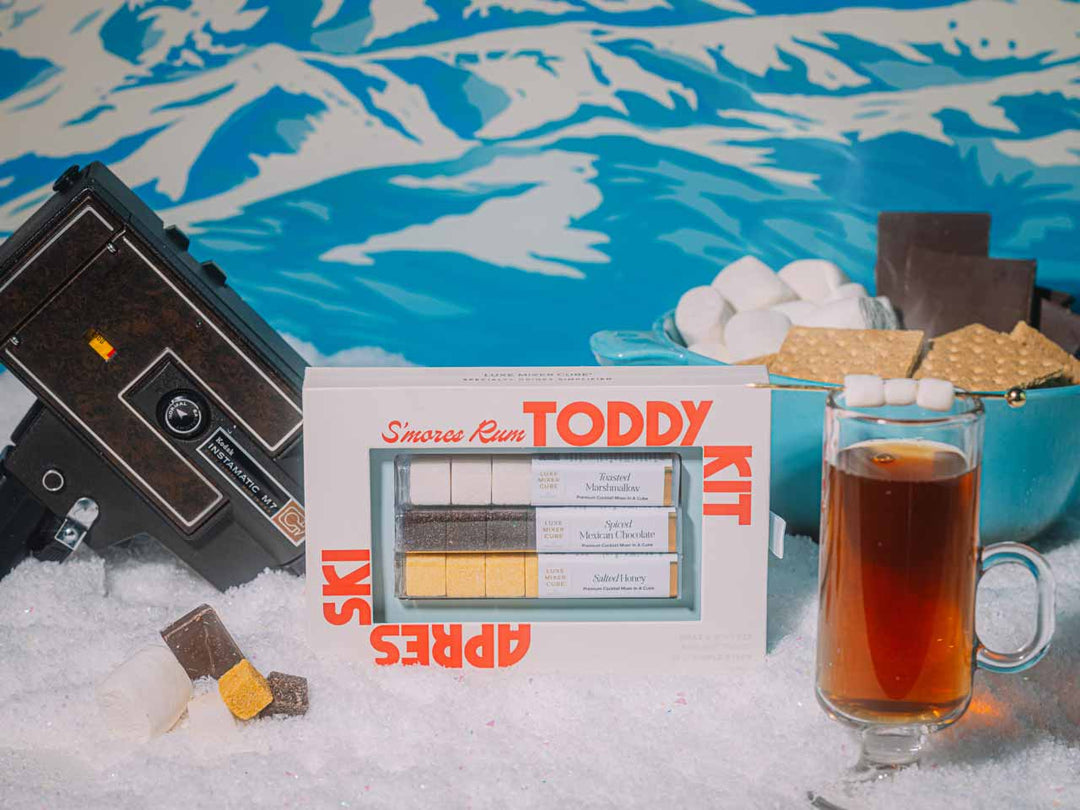 S'mores rum toddy garnished with a toasted marshmallow