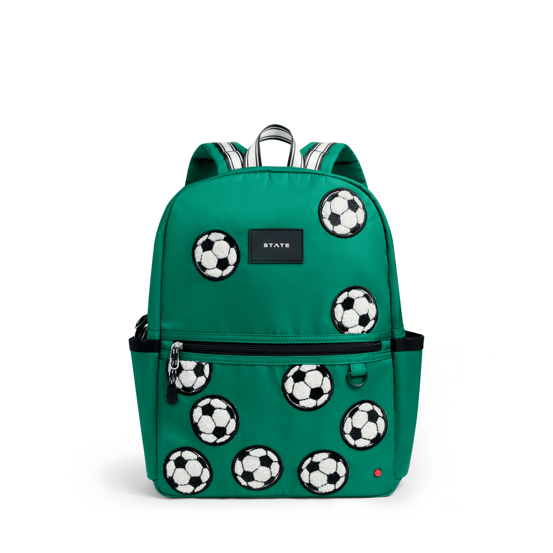 STATE Kane kids backpack in kelly green nylon with fuzzy white soccer ball patches, front view