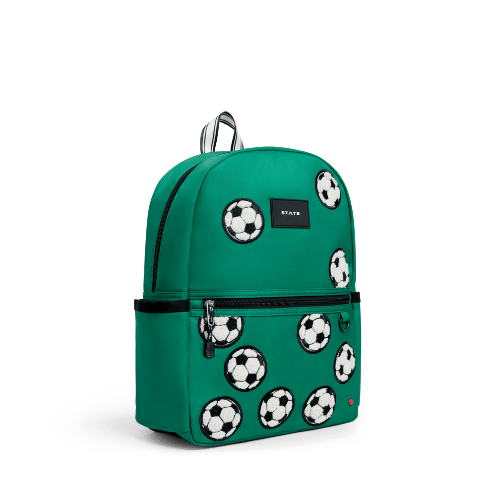 Green Fuzzy Soccer Balls Kane backpack at a three-quarter angle showing the zip front pocket