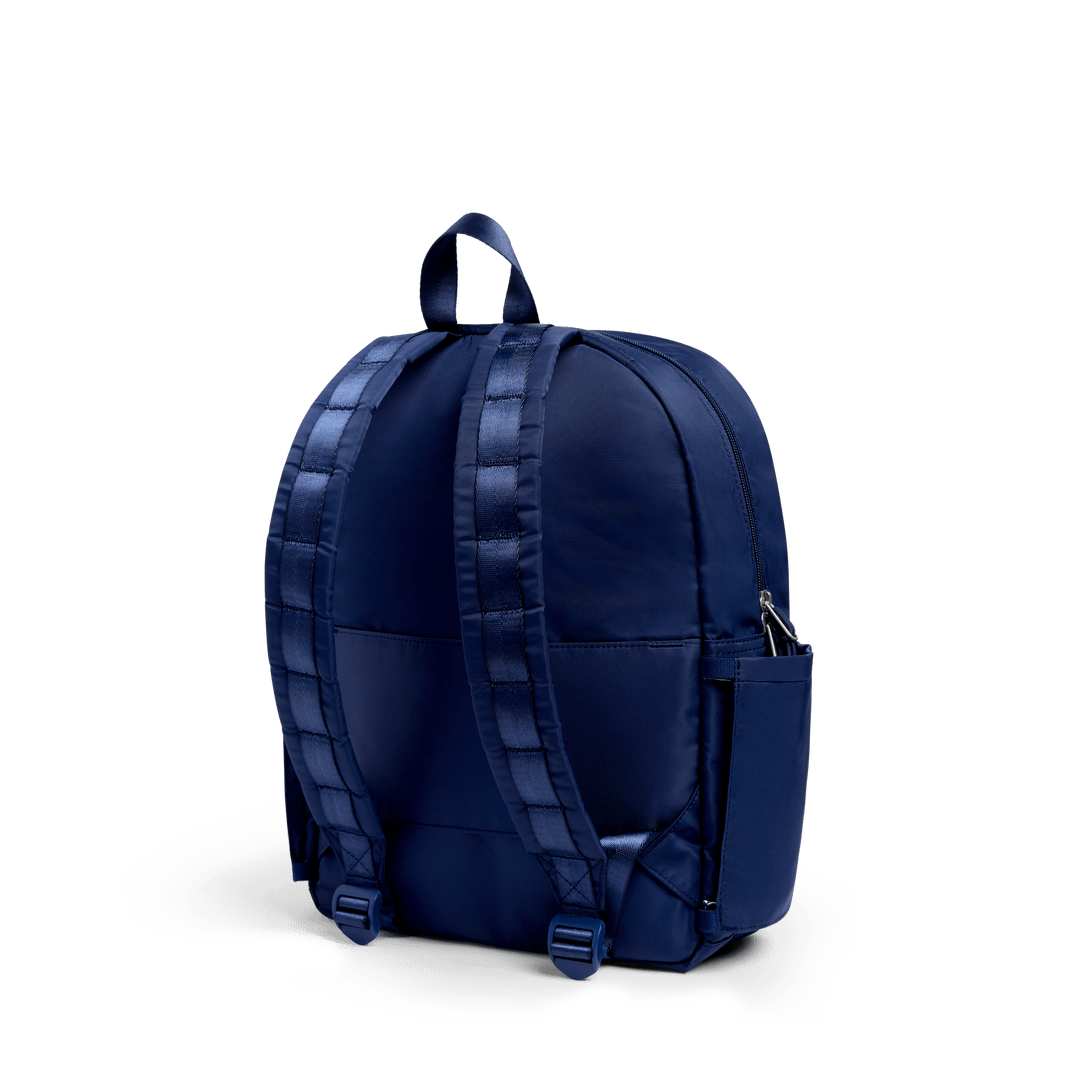 Back of the navy Blue Chevron Kane backpack with padded straps