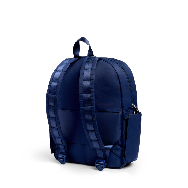 Back of the navy Blue Chevron Kane backpack with padded straps