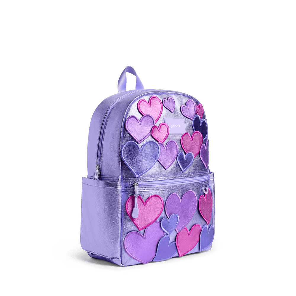 Lilac 3D Hearts Kane backpack at a three-quarter angle showing the side water bottle pocket
