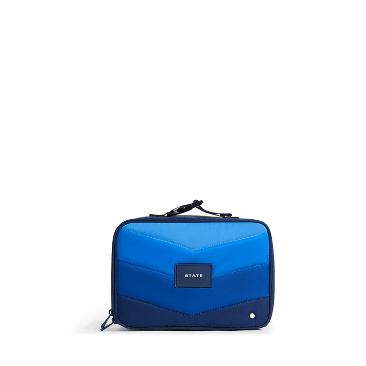 STATE Rodgers kids lunch box in Blue Chevron, quilted puffer in three shades of blue