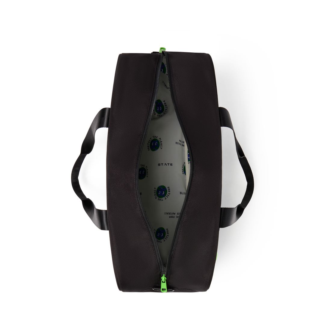Overhead view of an open black Rockaway duffle showing the roomy main compartment and lining