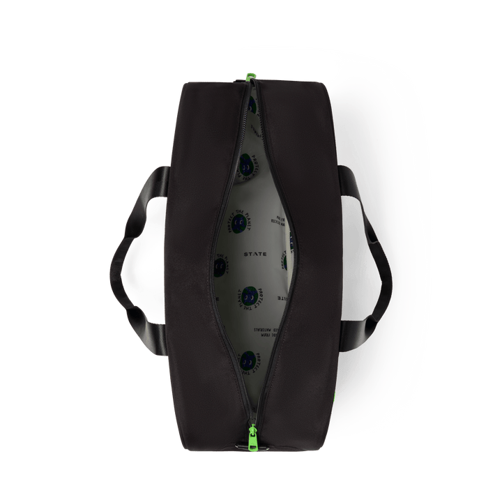 Overhead view of an open black Rockaway duffle showing the roomy main compartment and lining