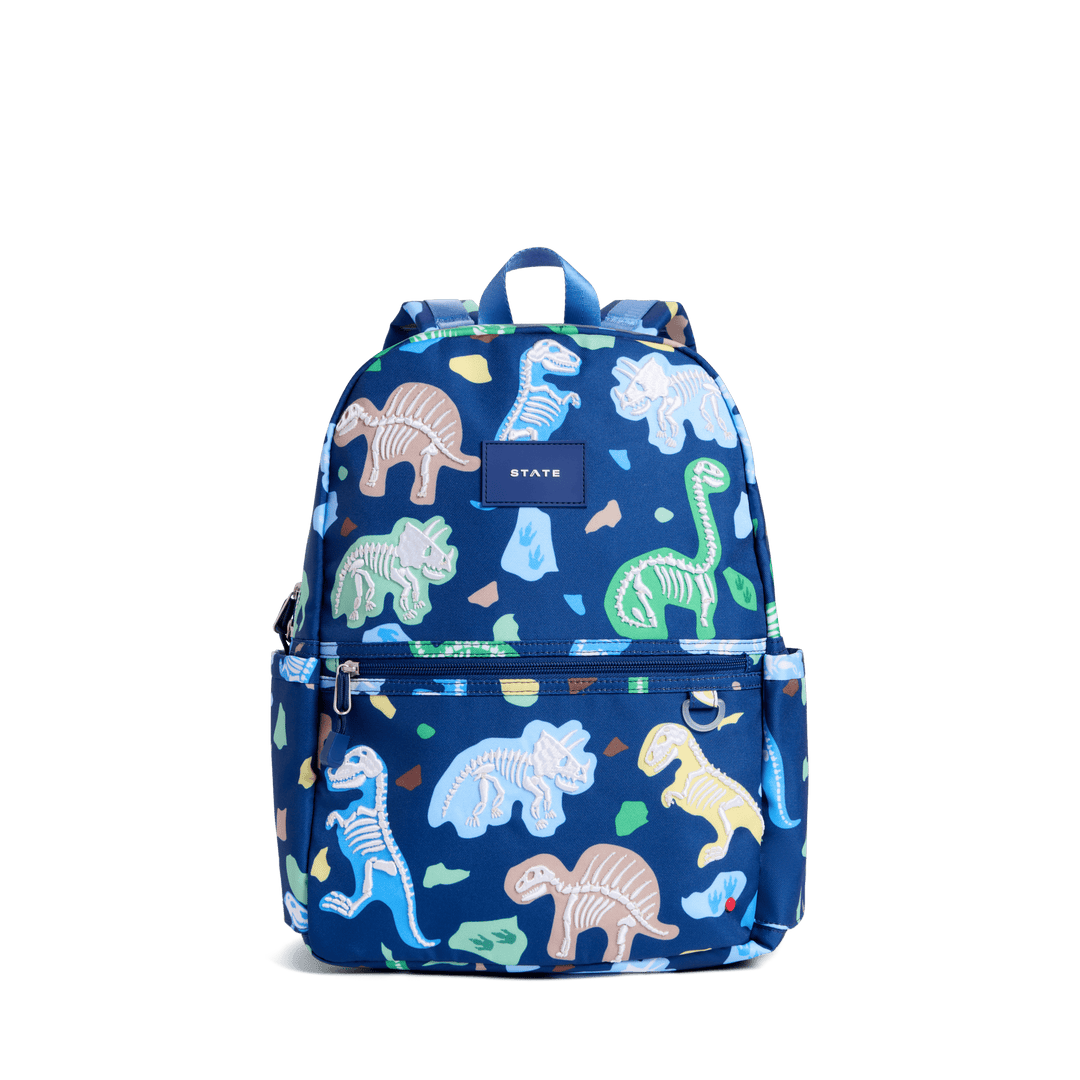 STATE Kane kids backpack in navy with pastel dinosaur fossil skeletons, front view