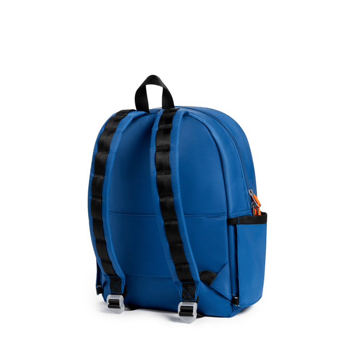 Back of the cobalt blue Dragon Kane backpack with black padded straps