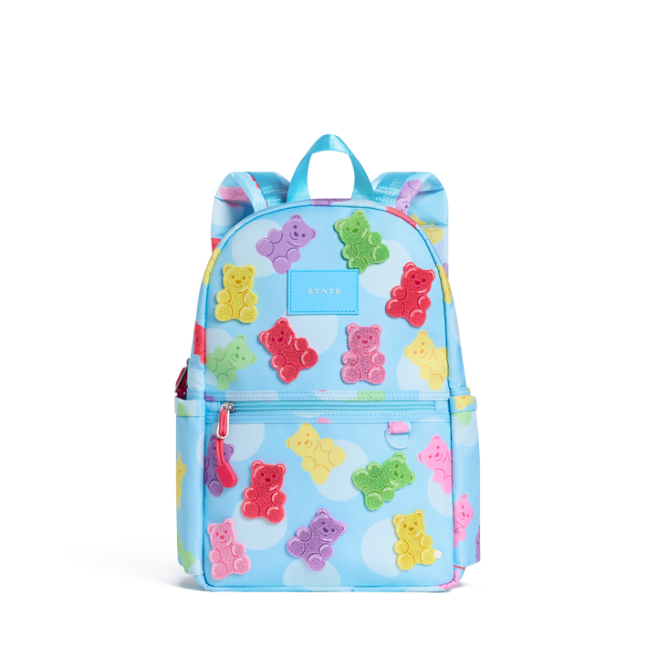 Light blue STATE Kane Mini covered in rainbow gummy bears and clouds, front view
