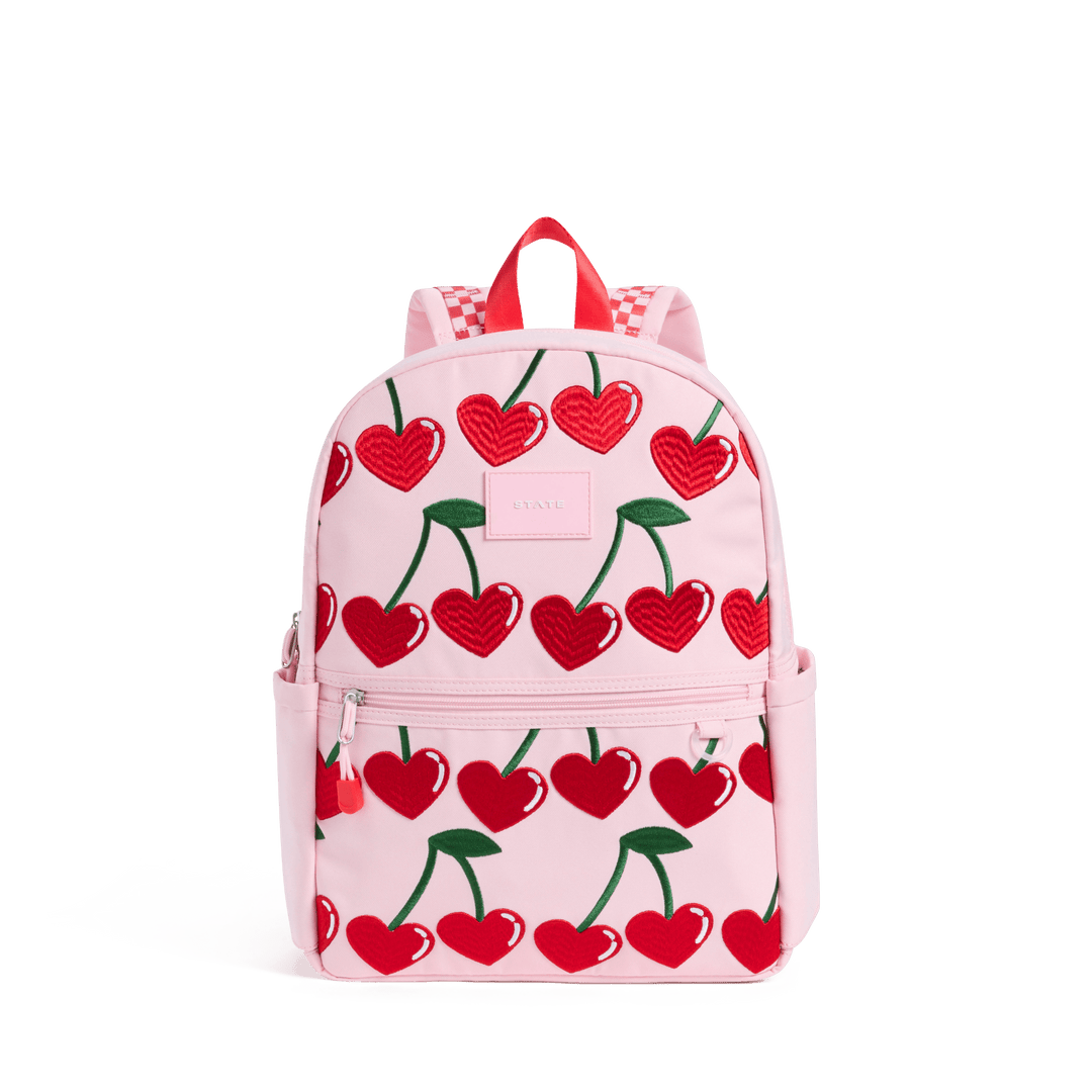 STATE Kane kids backpack in pale pink with rows of red heart-shaped cherries, front view