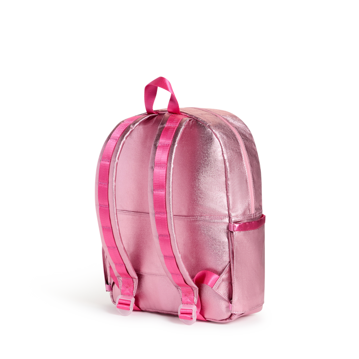 Back of the pink metallic Patchwork Bows Kane backpack with hot pink padded straps