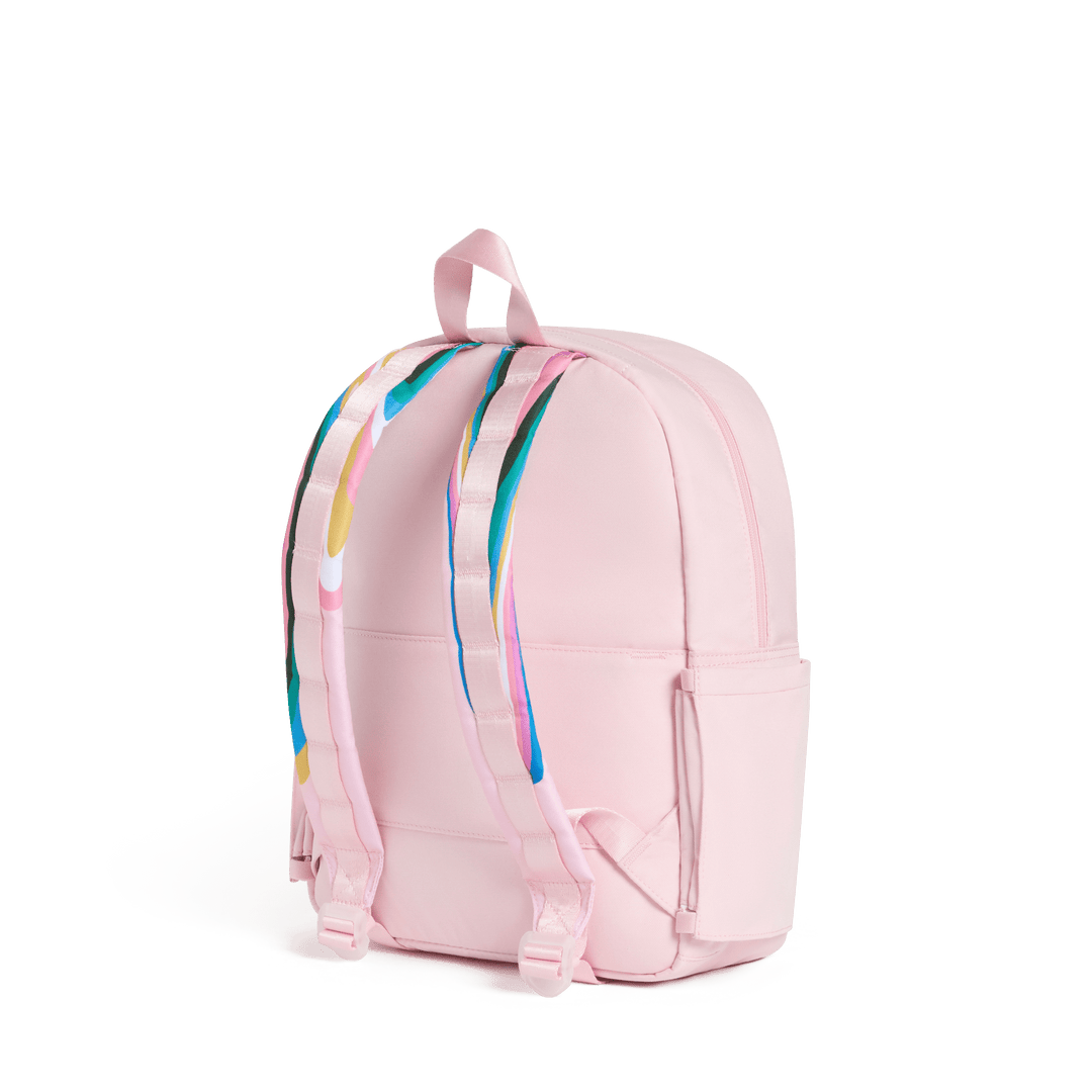 Back of the pink Paint Wave Kane backpack with swirl-print padded straps