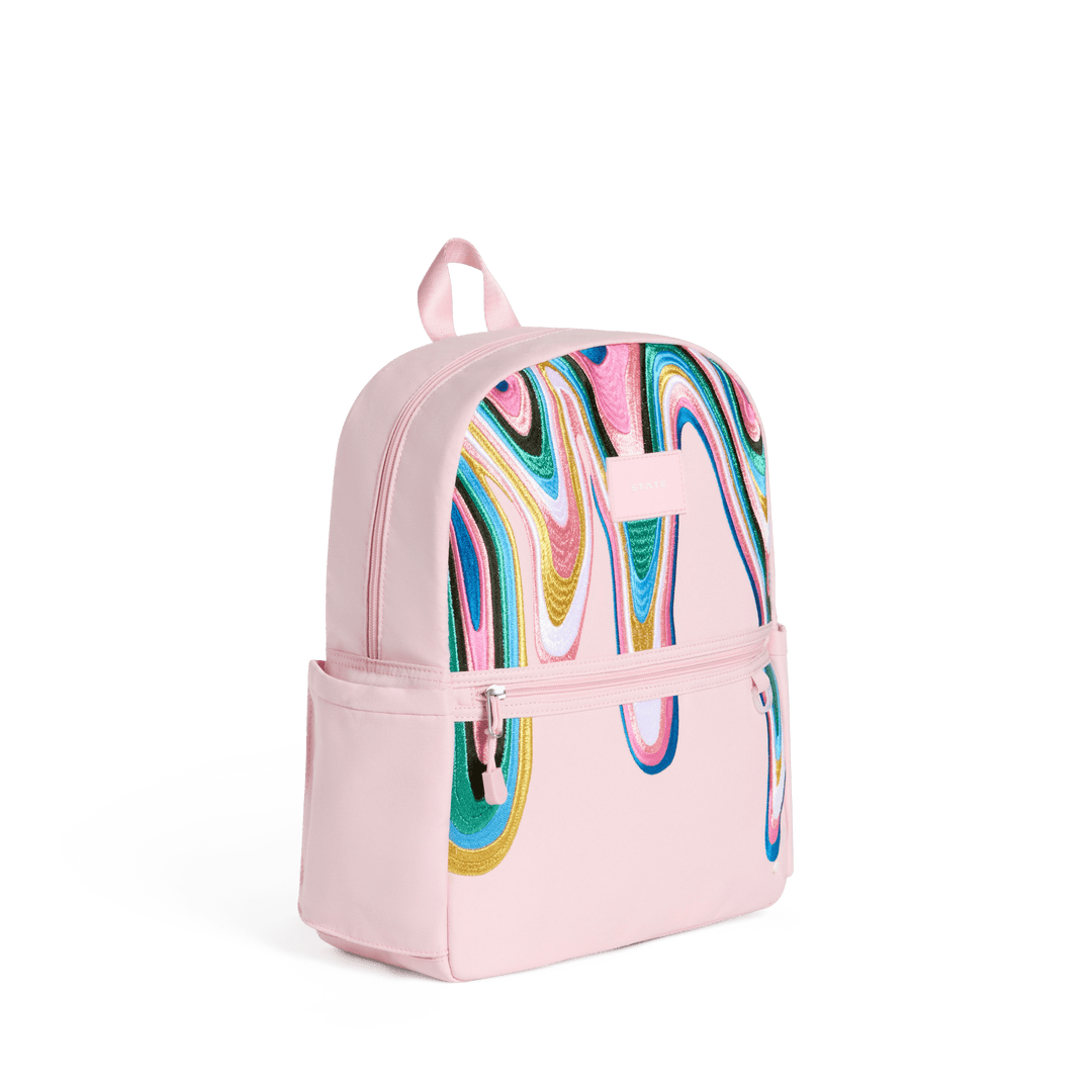 Pink Paint Wave Kane backpack at a three-quarter angle showing the side pocket